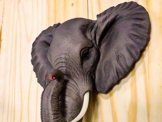 Carved wooden elephant and rattan home decor from Koh Samui