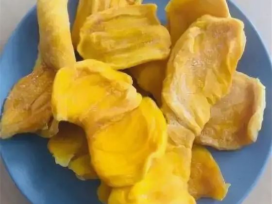 Dried mango on a plate, a Thai snack worth taking home from Koh Samui