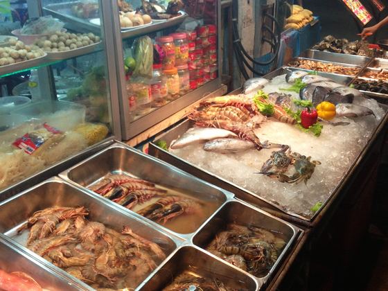 Grilled seafood and skewers at a Koh Samui street food stall