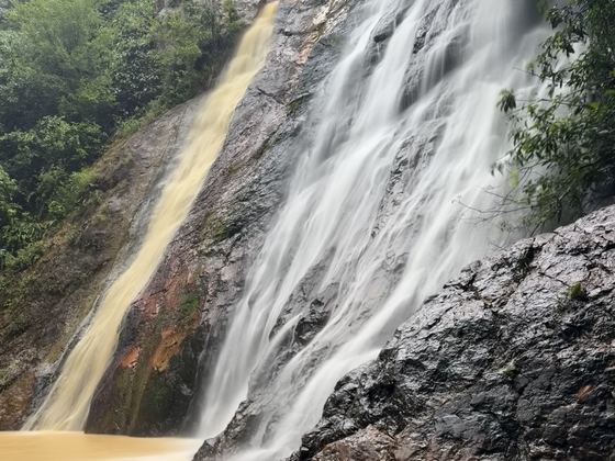 Waterfall running over rock in the Koh Samui jungle